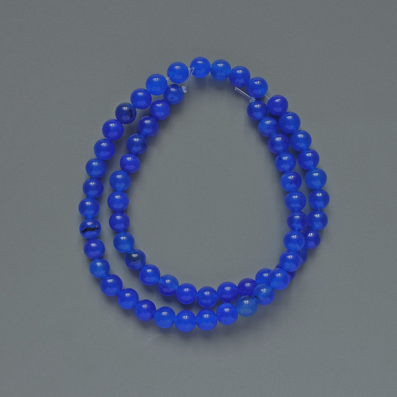 Apatite beads (synthetic) smooth spheres, 6.5 mm diameter, 37 cm length on thread