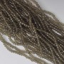 Seed beads Czech crystal transparent champagne 'Rondelle', diameter 3.5x2.5mm, length 38 cm +/- on thread