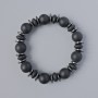 Bracelet with smooth shungite rondelle beads and round beads, diameter 10×4.5 mm, 12 mm+-, length 18 cm+-, (stretch) with hematite inserts