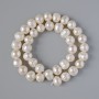 Textured freshwater pearls, diameter 9.5 × 8.5 mm, length 35 cm on a thread