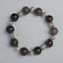 Garnet bracelet with smooth beads, 14 mm diameter ± (stretch), length 18 cm ± with metal inlays