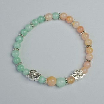 Bracelet of tinted quartz and amazonite with smooth beads, 6–8 mm diameter, elastic, length 18 cm +/- with metal inserts