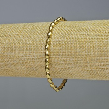 Gold-colored faceted hematite bracelet, oval beads, 4x6mm diameter, 18cm length, stretch