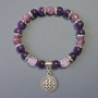 Bracelet with rubellite tourmaline faceted beads, 8 mm diameter; smooth sugilite beads, 8 mm diameter; with metal inlays, length 18 cm; elastic