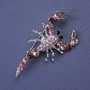 Brooch 'Scorpion' with pink and purple crystals, silver-tone metal, 47x25 mm +