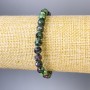 Bracelet with faceted zoisite beads, 6 mm diameter, 18 cm length, stretch