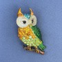 Owl brooch-pendant with yellow, blue, and green rhinestones on golden metal, diameter about 23 mm, length about 50 mm