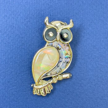 Brooch-pendant Owl Halotis with black enamel and golden metal, diameter 24mm +-, length 45mm +-