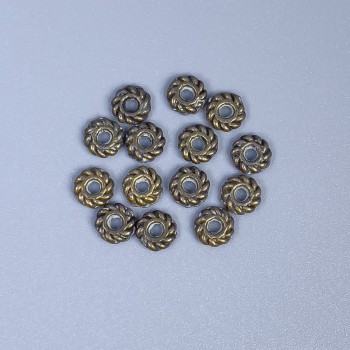 Bronze-colored bead insert finding, 4x1 mm diameter with approx. 1 mm hole, packaging 22 pcs