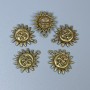 Pendant hardware Sun and Moon bronze color, size 20x23x3 mm +/- hole diameter 1.5 mm +/- packaging 10 pcs