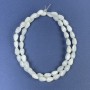 Mother-of-pearl drop beads 8x5mm+- on thread, length 40 cm+