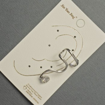 Ear cuff in silver-tone metal with white crystal, 16x28mm