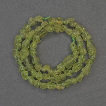 Chrysolite Beads, Unpolished Stone, Drop-Shaped, 6-9×5 mm, on a Thread, Length 38 cm+