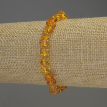 Amber bracelet with faceted 7x5 mm beads and 2 mm seed beads, length 18 cm, stretch