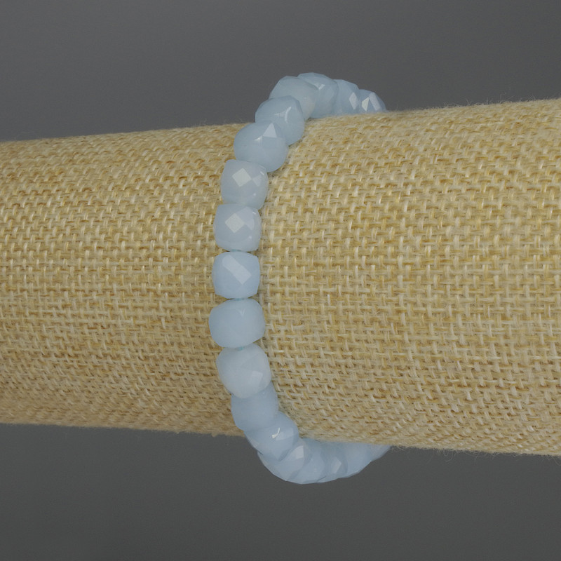 Aquamarine faceted cube bracelet, 7 mm diameter, 18 cm stretch