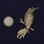 Magnetic brooch Bird with crystals, golden metal, 55×27 mm
