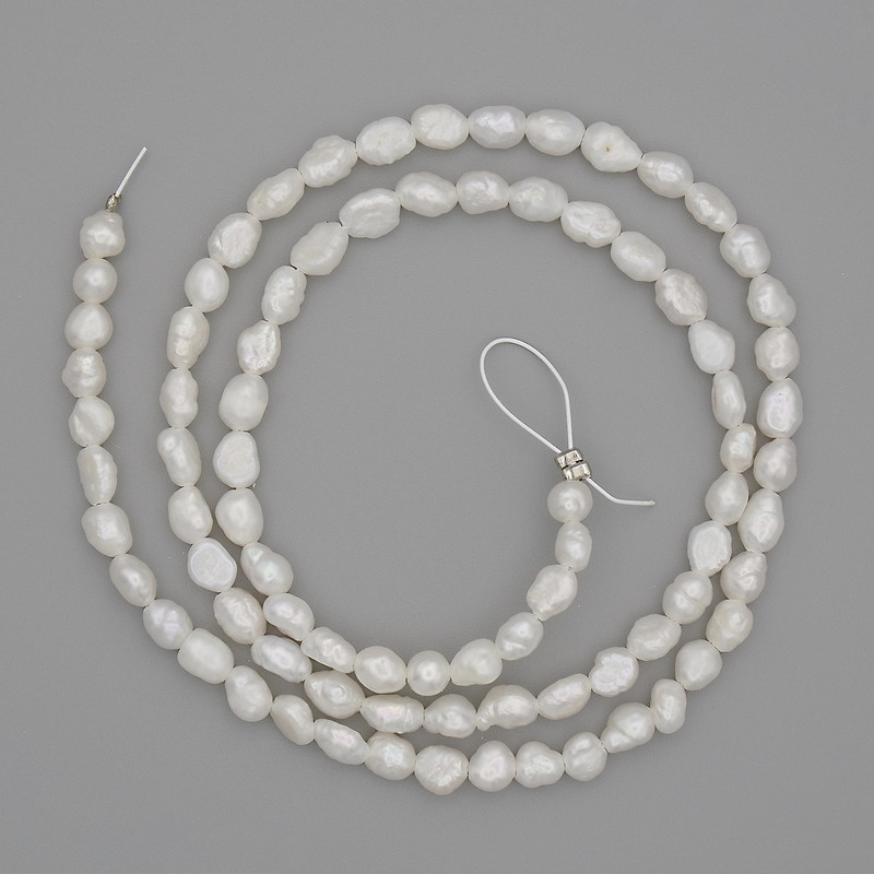 Natural freshwater pearl beads 5–6×3–4 mm, 39 cm length, on thread