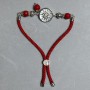 Textile bracelet, 5.5 mm diameter ±, adjustable; coral faceted bead 8 mm ±, with metal insert, 17 mm diameter ±, silver-colored metal