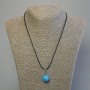 Turquoise ball pendant 16mm +/- on a black waxed cord, 1.5 mm diameter, length 44 cm +/-