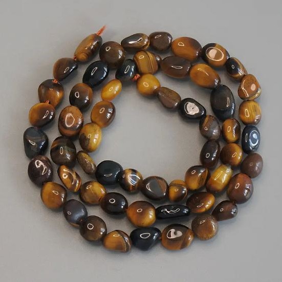 Tiger's Eye Beads, Faceted, Diameter 6–10×7 mm, Length 40 cm ± on a Thread
