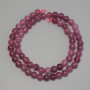 Tourmaline beads smooth round spheres, diameter 6.5 mm +/- on a thread, length 38 cm+
