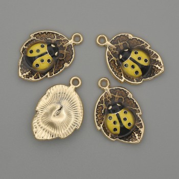 Кулон підвіска Сонечко на листочку жовта емаль золотистий метал, діаметр 14х22мм+- уп. 4шт