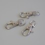 Price per pack / 10 pcs. Carabiner clasp, diameter 37×16 mm, metal color silver