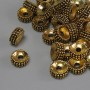 Bead-insert, dark gold color, diameter 7.5×3.5 mm, hole diameter 2.3 mm, packaging 20 g (~35 pcs)
