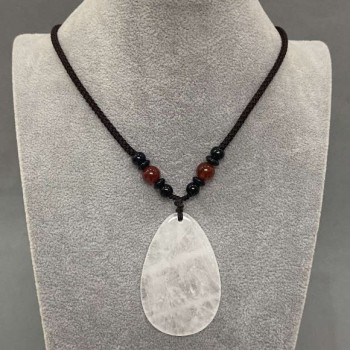 Teardrop pendant with white quartz 55x35mm (+-) on a cord with a carnelian bead, 65 cm long+