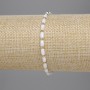 Bracelet with white Czech crystal, faceted cylindrical beads 5x3 mm, 2 mm beads, 18 cm length, stretch