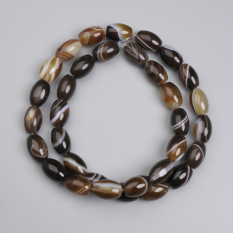 Barrel-shaped agate beads, 12×8 mm, about 39 cm long on beading thread