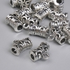 Silver metal bail findings, size 12x6 mm, hole diameters 3 mm and 2 mm, packaging 20 g (~17 pcs)