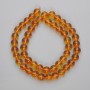 Citrine beads pressed smooth spheres, 8mm diameter, on thread, length 38 cm