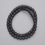 Beads made of black volcanic lava, cylindrical, 6x6 mm diameter, on thread, length about 38 cm
