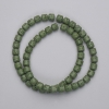 Green lava beads, cylinder shape, 6x6 mm, on beading wire, length 38 cm+