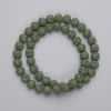 Green lava beads, 8 mm diameter, on 38 cm strand