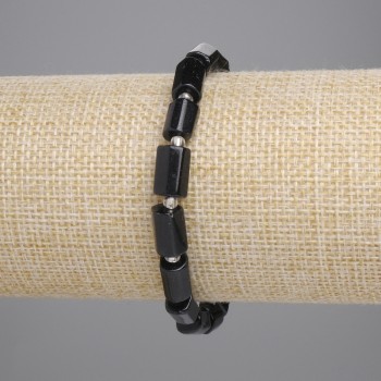 Bracelet of black tourmaline, faceted, 8-10×6 mm diameter ±, seed beads 3 mm ±, length 18 cm ±, stretch
