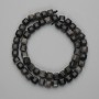 Beads of Silvery Obsidian, Faceted Cube 7x7 mm, approx. 37 cm on thread