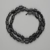 Shungite beads, faceted cut 7–8×5–6 mm, on thread, 40 cm long