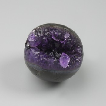 Amethyst natural stone sphere with geode, diameter 40–50 mm ± assorted sizes, weight from 100 g. (Price per 100 g)