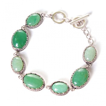 Clearance. Jade bracelet with a 'tooth' bezel, seven oval stones 20x16 mm and 13x16 mm, length 18-21 cm