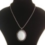 Pendant on chain with large dark gray mother-of-pearl, metal Greek setting with crystals, oval 45×55 mm, length 46–56 cm