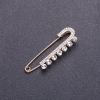 Gold-tone metal brooch pin 5.5×1.8 cm