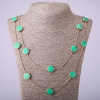 Long-chain necklace with green 'coin', length 66-70 cm