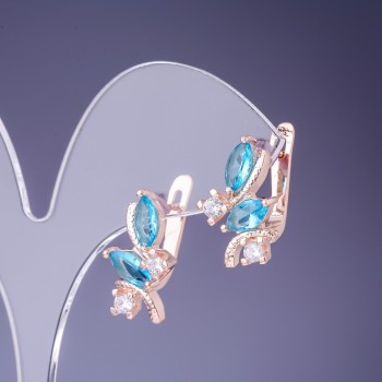 Earrings with blue crystals 19x12 mm in gold-toned metal