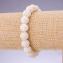 Bracelet made of natural white sponge coral, smooth beads, 10 mm diameter, on elastic, 18 cm length