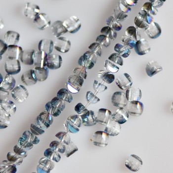 Crystal beads in Swarovski style, colorless with blue 'gasoline' coating, 2.5×4 mm, on a 48 cm strand