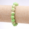 Bracelet 'Variscite' (pressed) lime green smooth beads, 10 mm diameter, 18 cm length on elastic