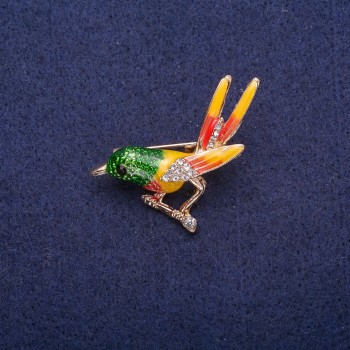 Brooch 'Bird on a Branch' with enamel and crystals, gold-tone metal 34x33mm