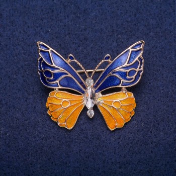 Butterfly Brooch with blue and yellow enamel, white crystal, gold-tone metal 30x36mm
